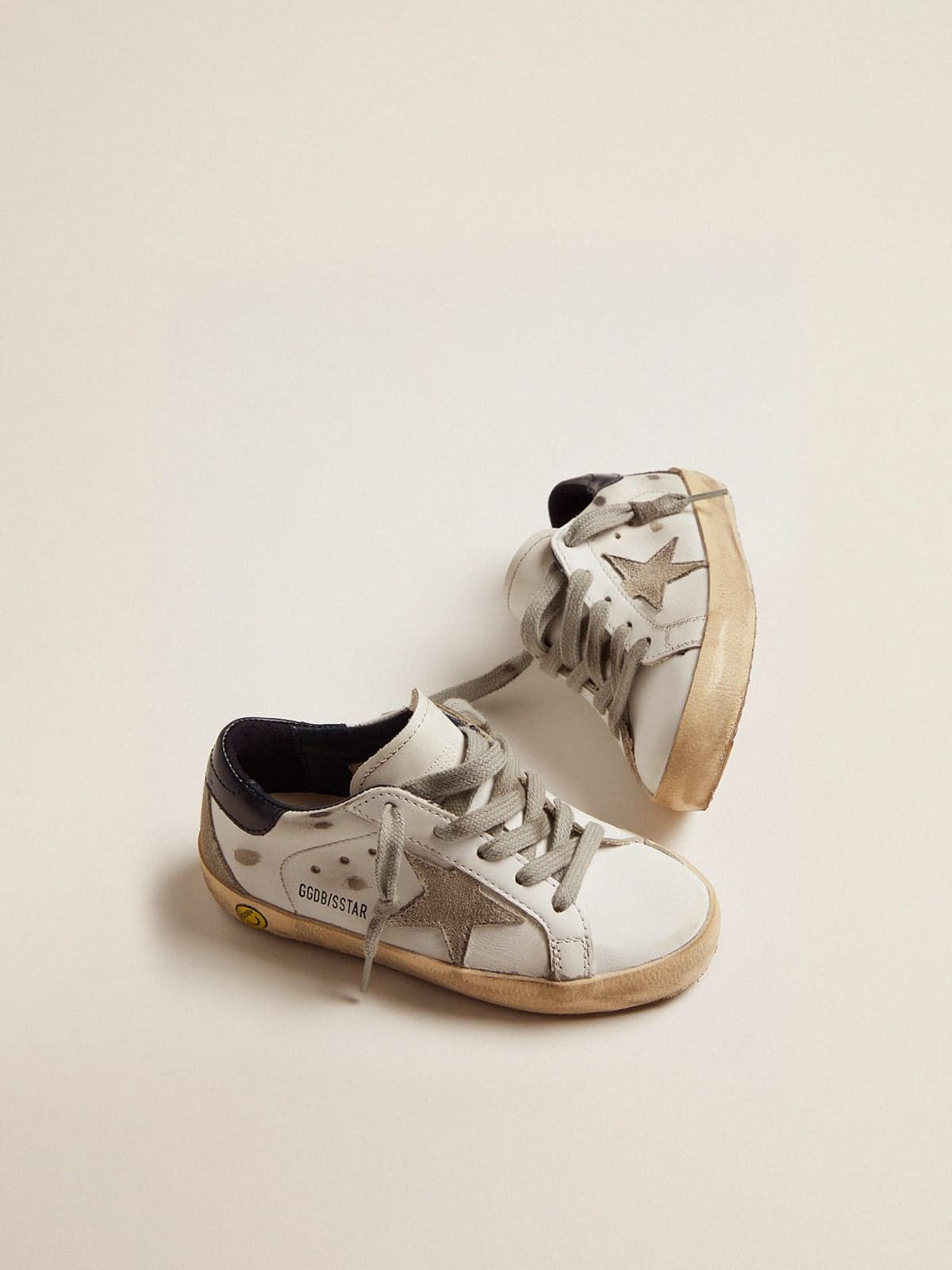 Junior Super-Star with gray suede star and blue heel tab