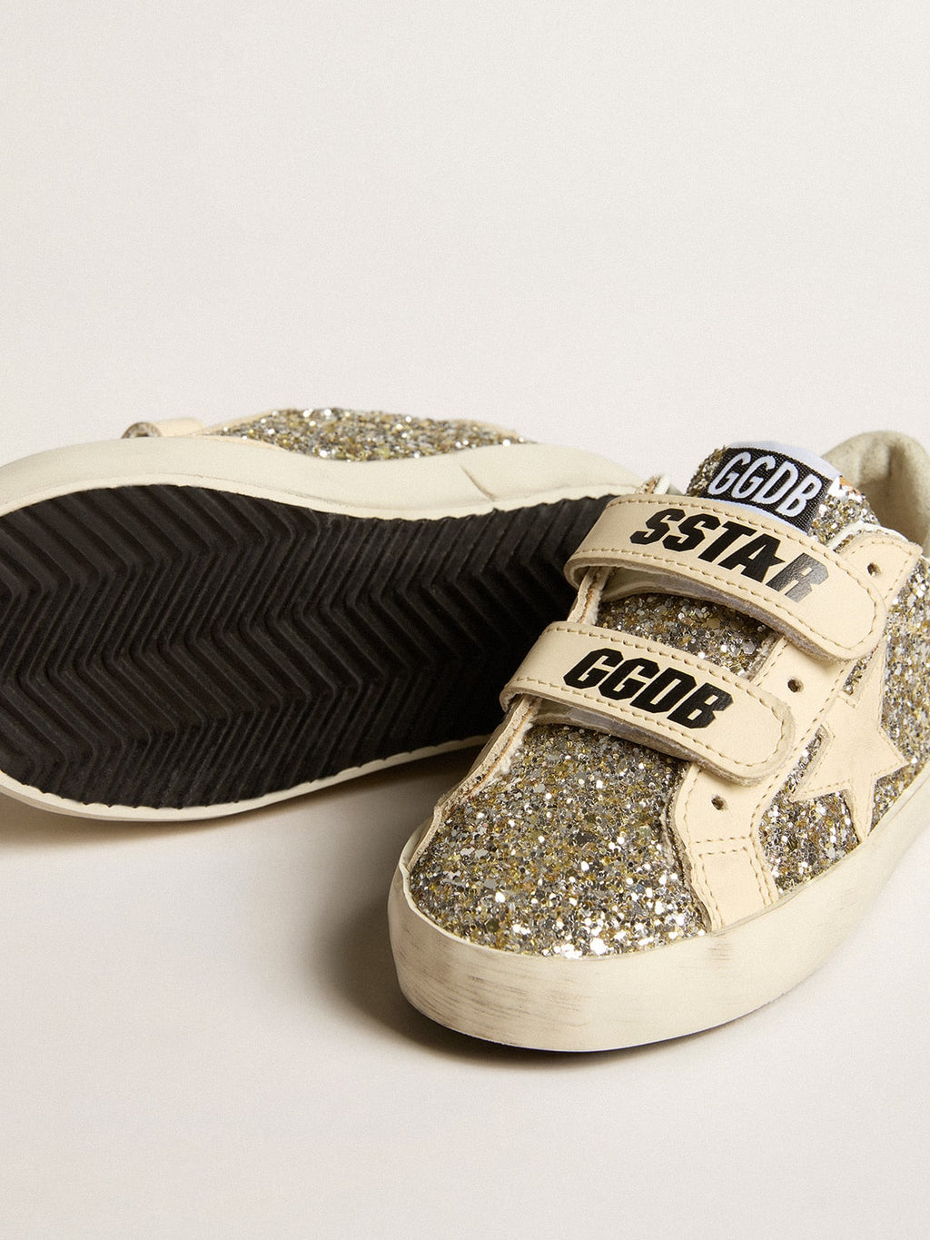 Old School Junior in platinum glitter with leather star and heel tab