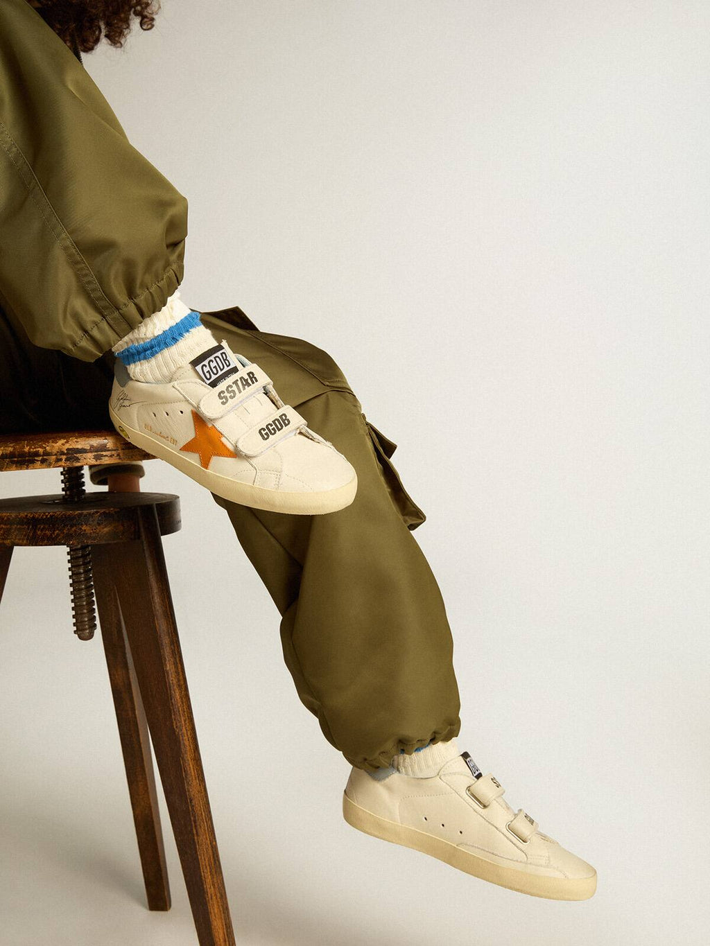 Junior Old School in leather with orange star and baby blue heel tab