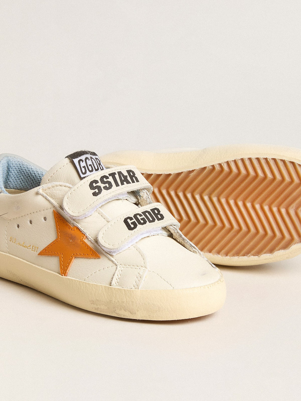Junior Old School in leather with orange star and baby blue heel tab