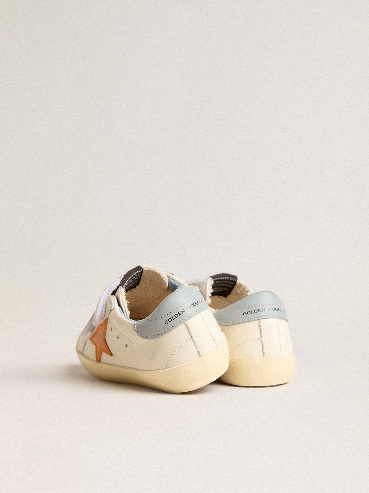 Junior Old School in leather with orange star and baby blue heel tab
