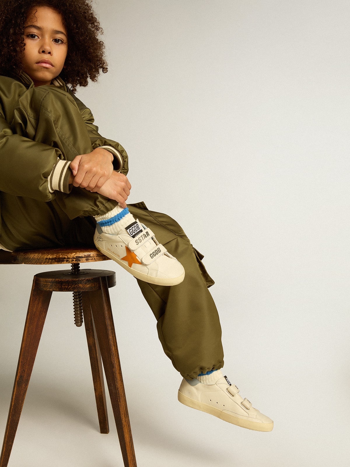 Junior Old School in leather with orange star and baby blue heel tab