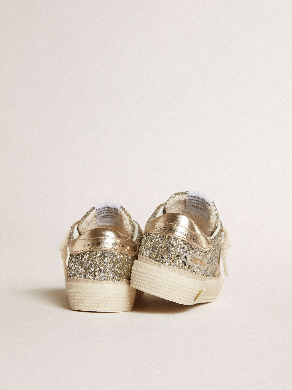 May Junior in platinum glitter with metallic leather star and heel tab