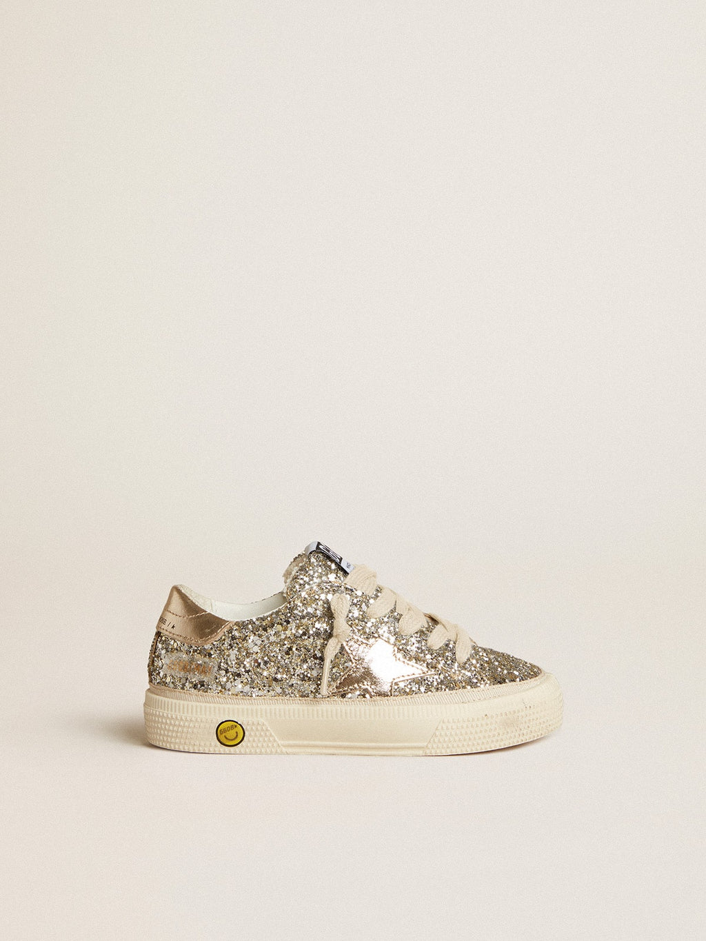 May Junior in platinum glitter with metallic leather star and heel tab
