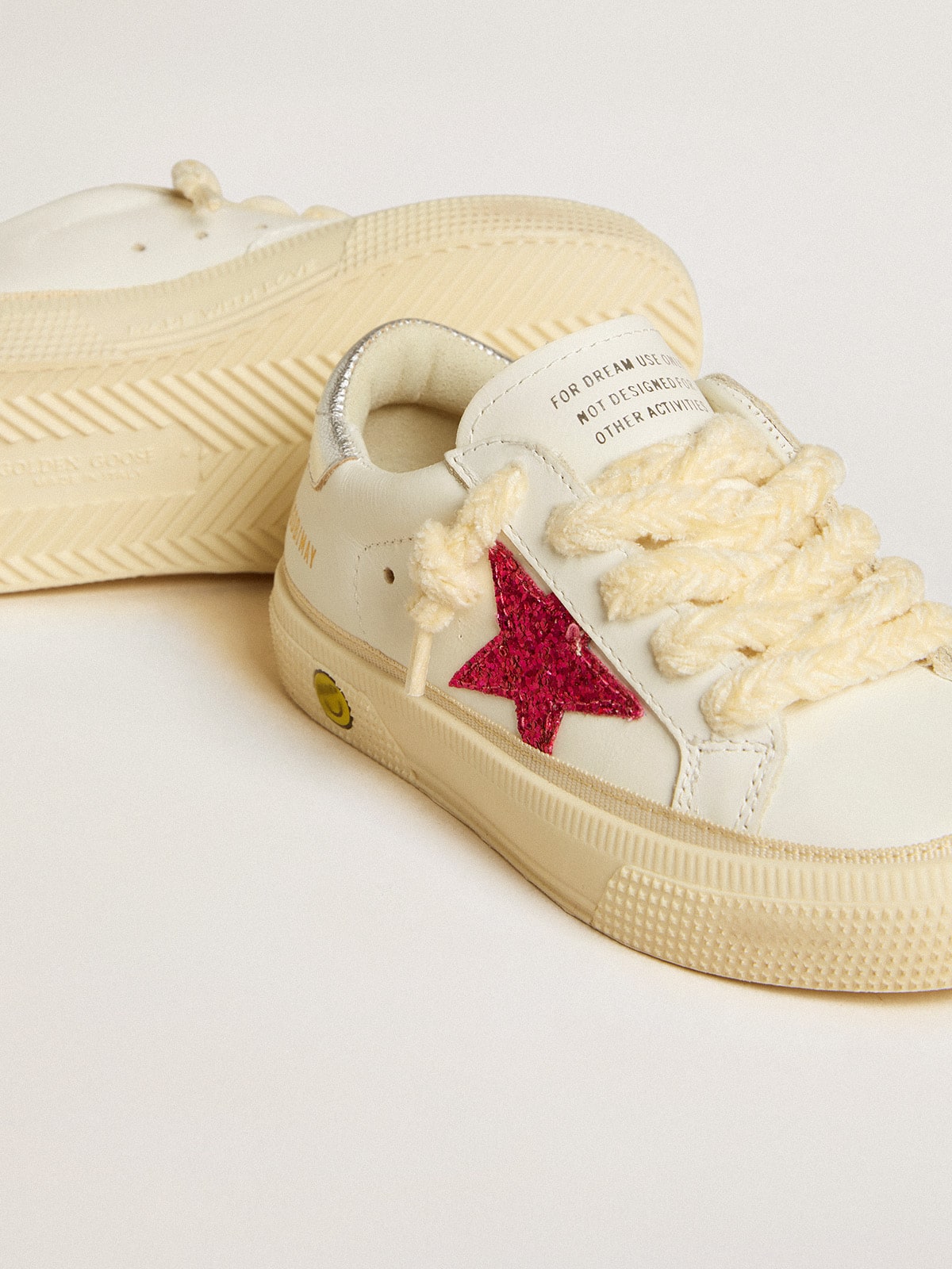 May Junior with fuchsia glitter star and metallic leather heel tab