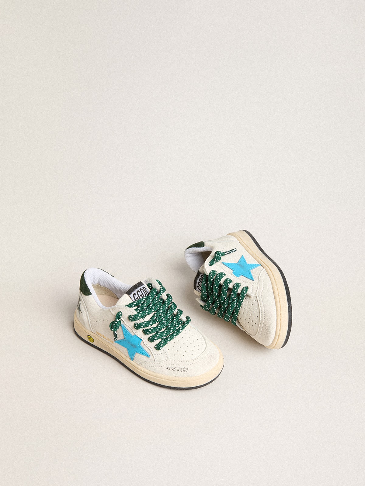 Junior Ball Star with turquoise star and green suede heel tab