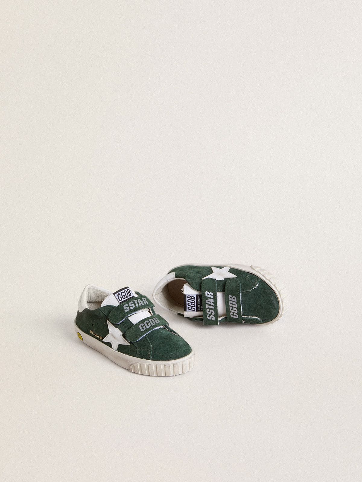 Old School Junior in green suede with white leather star and heel tab