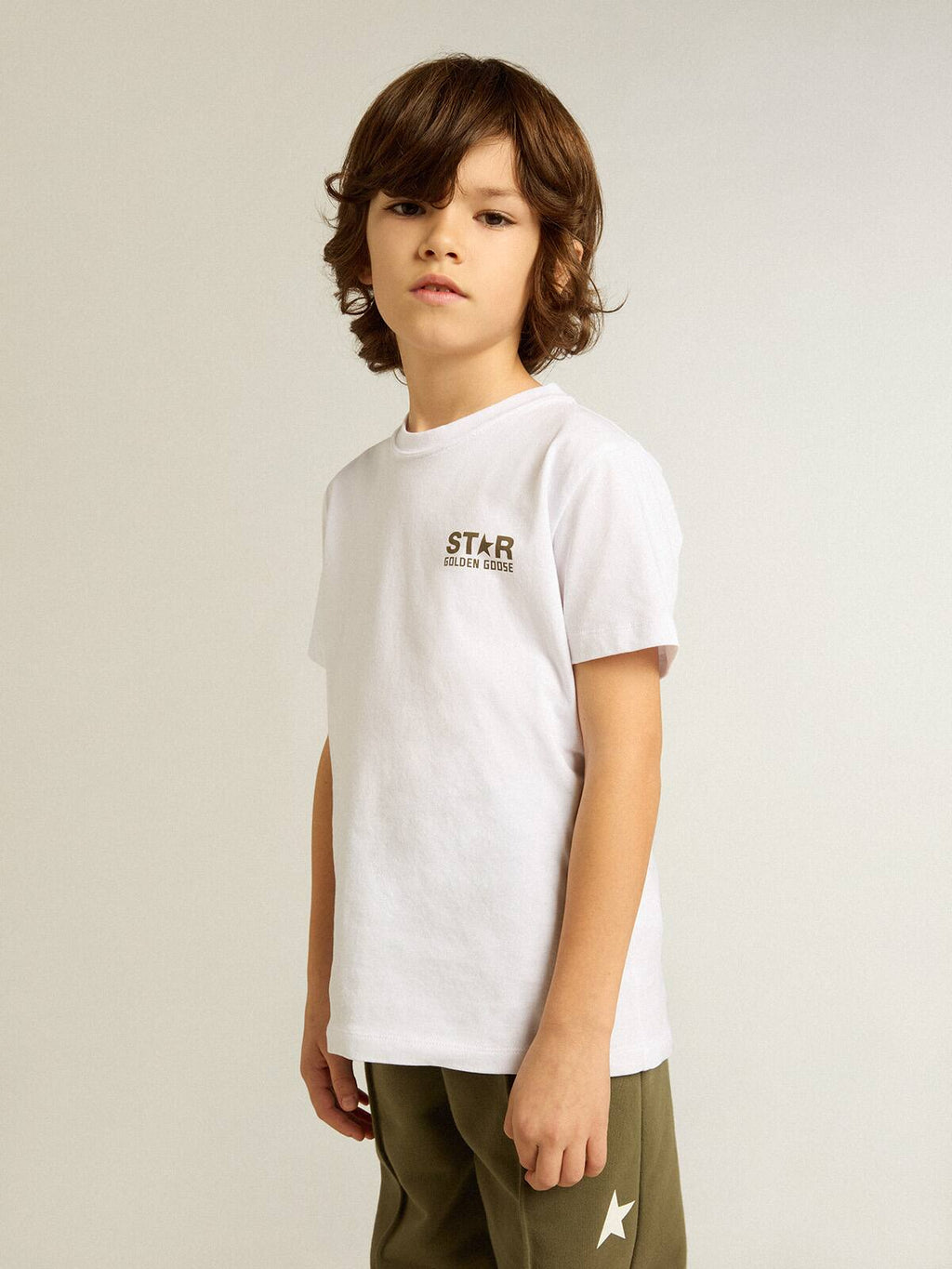 Boys' white T-shirt with contrasting dark green logo and star