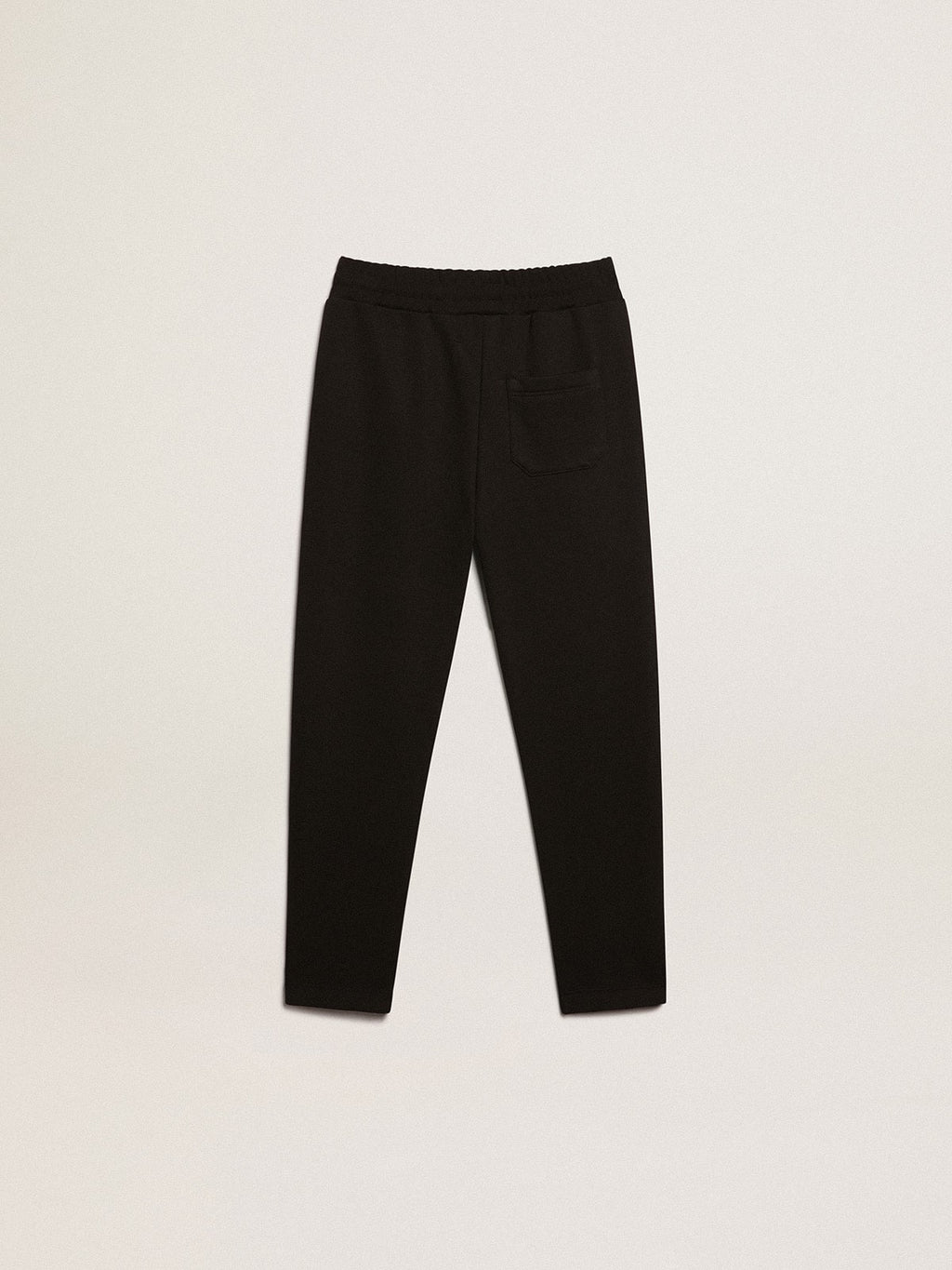 Boys’ black joggers with white stars
