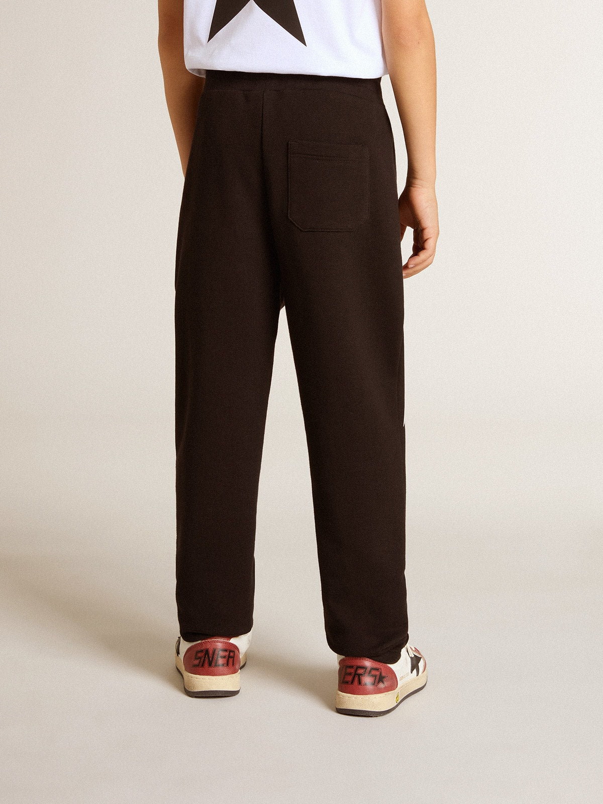 Boys’ black joggers with white stars