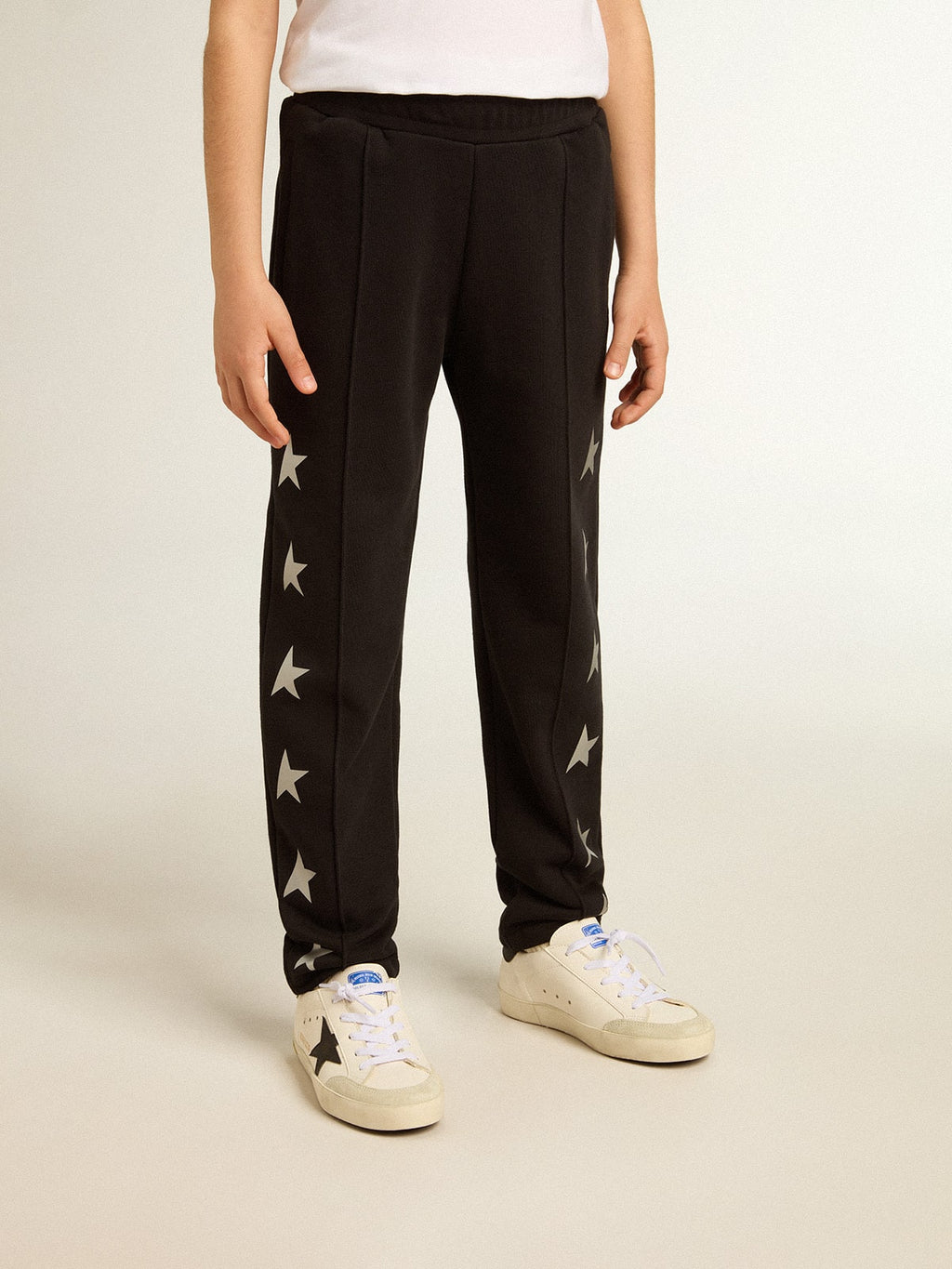Boys’ black joggers with white stars