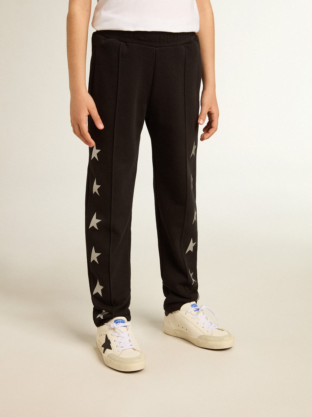 Boys’ black joggers with white stars