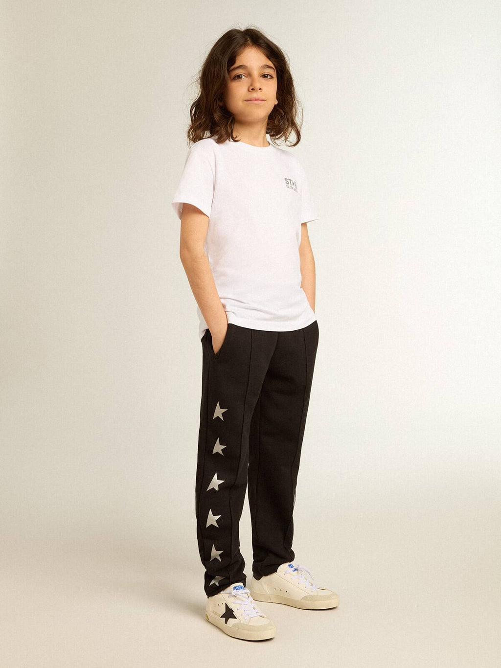 Boys’ black joggers with white stars