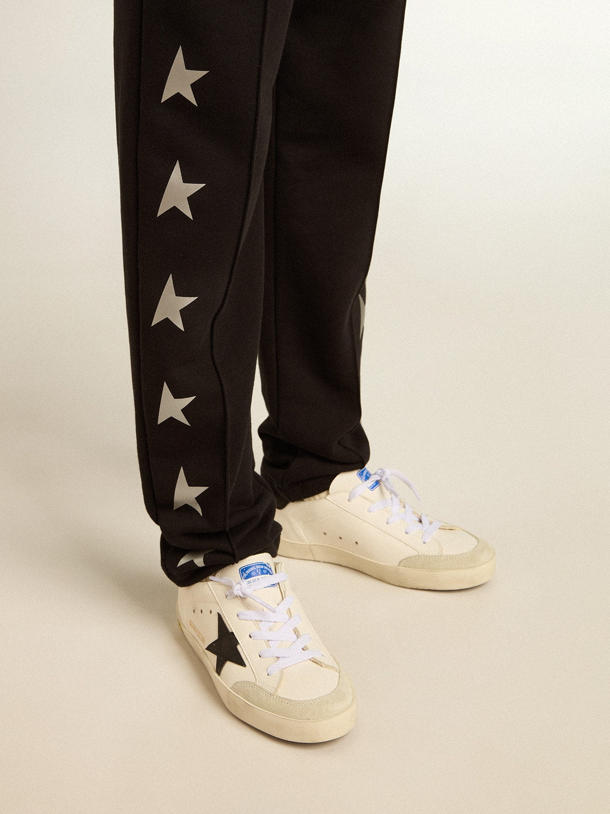 Boys’ black joggers with white stars