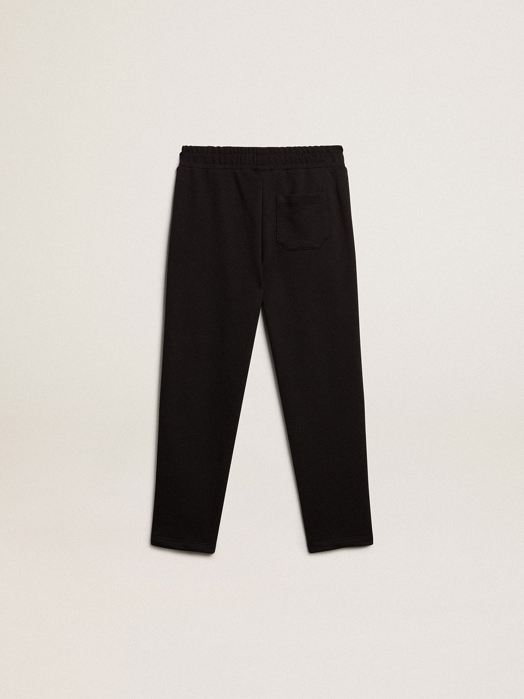 Boys’ black joggers with white stars