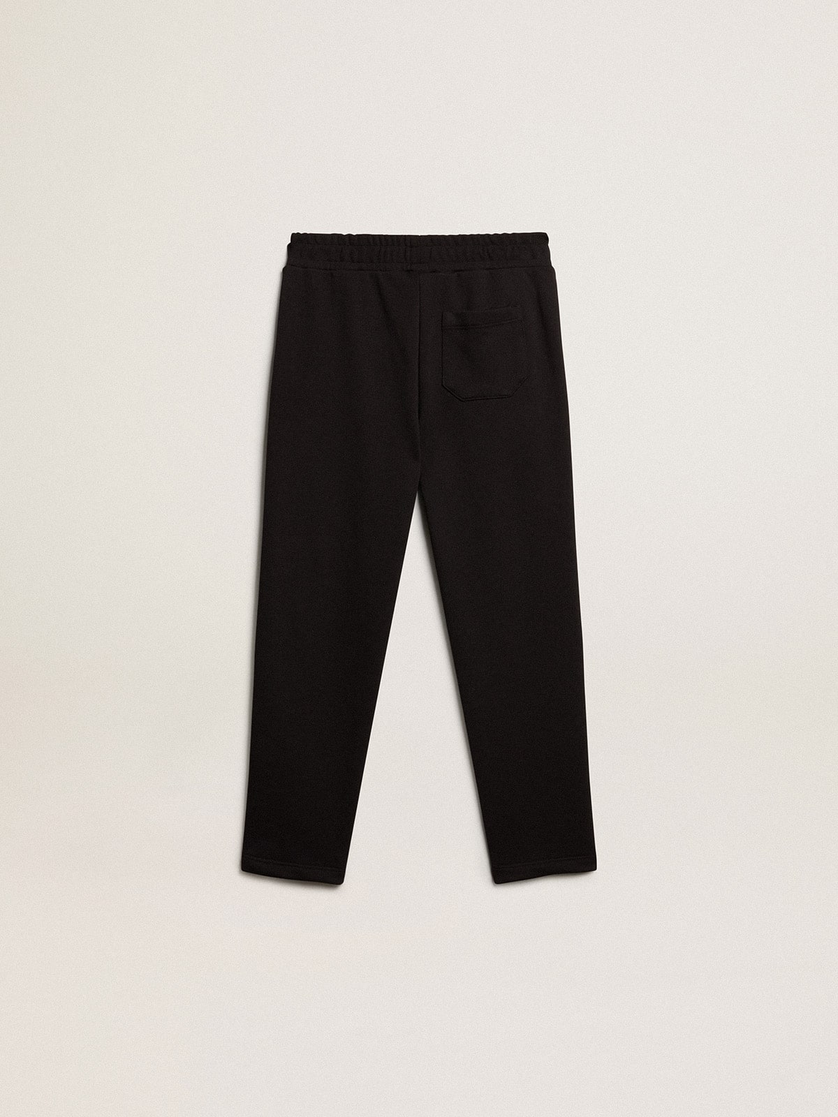 Boys’ black joggers with white stars