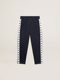 Dark blue joggers with white strip and contrasting stars