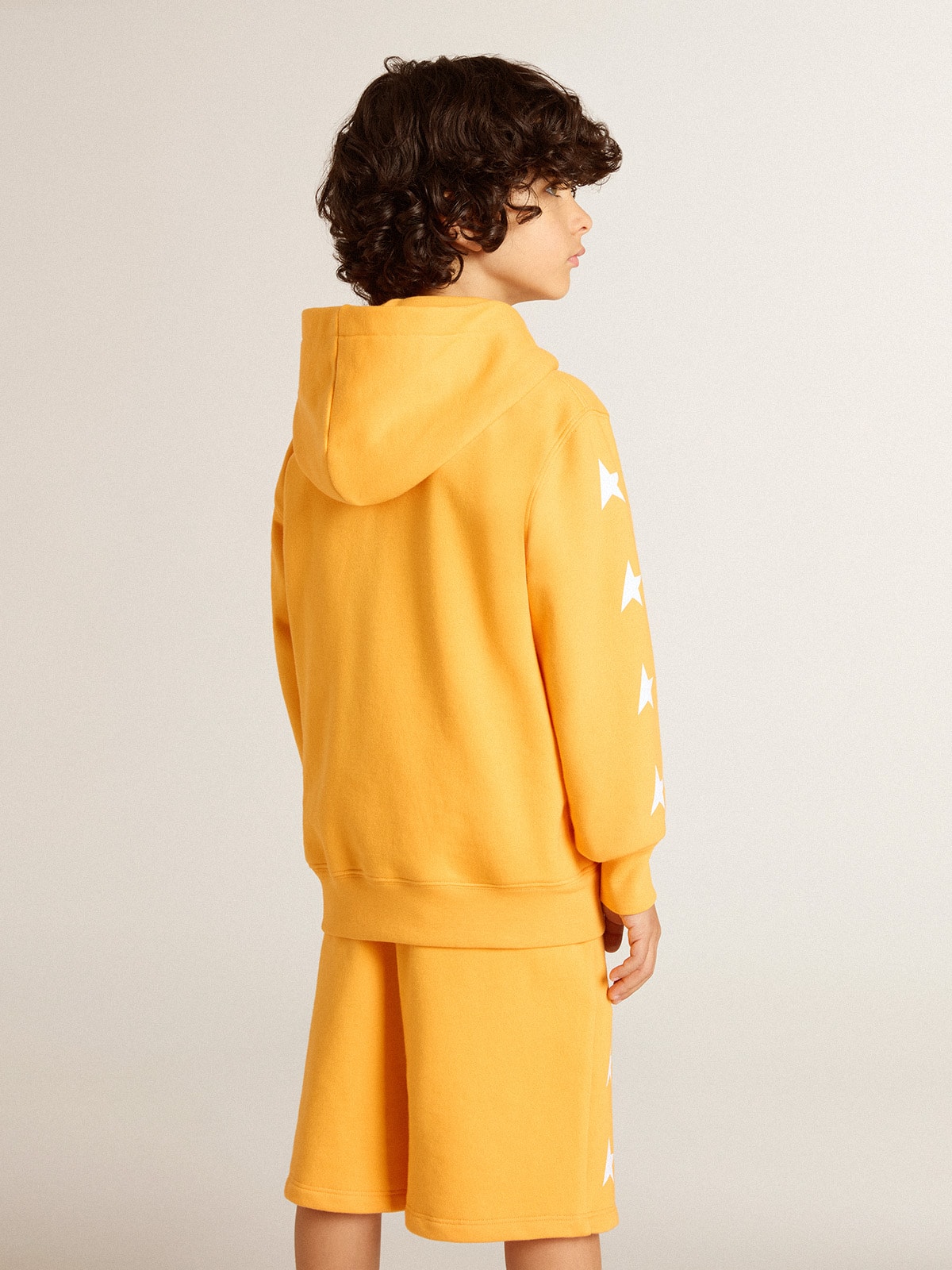 Boys’ orange sweatshirt with zip fastening