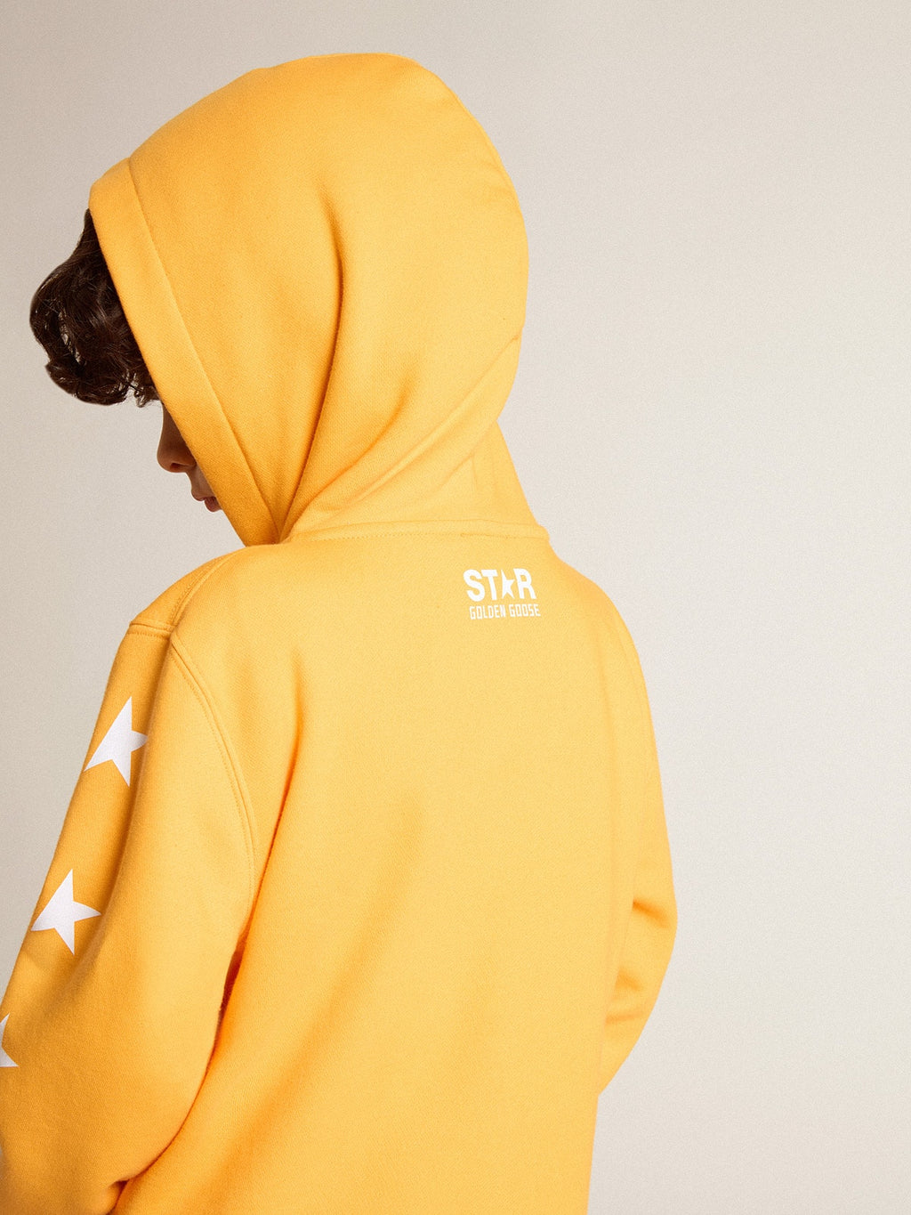 Boys’ orange sweatshirt with zip fastening