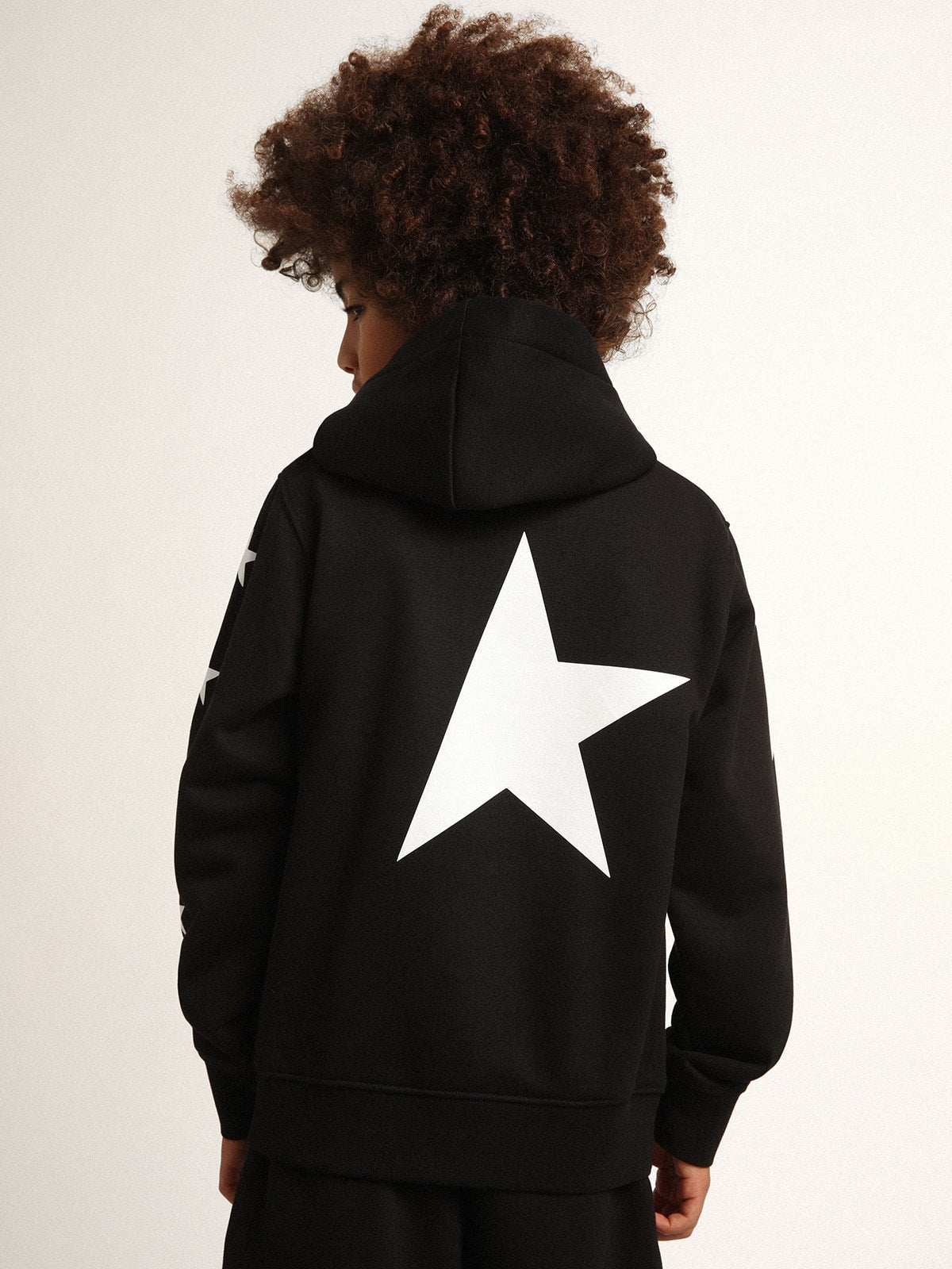 Boys’ hooded sweatshirt in black with contrasting white stars