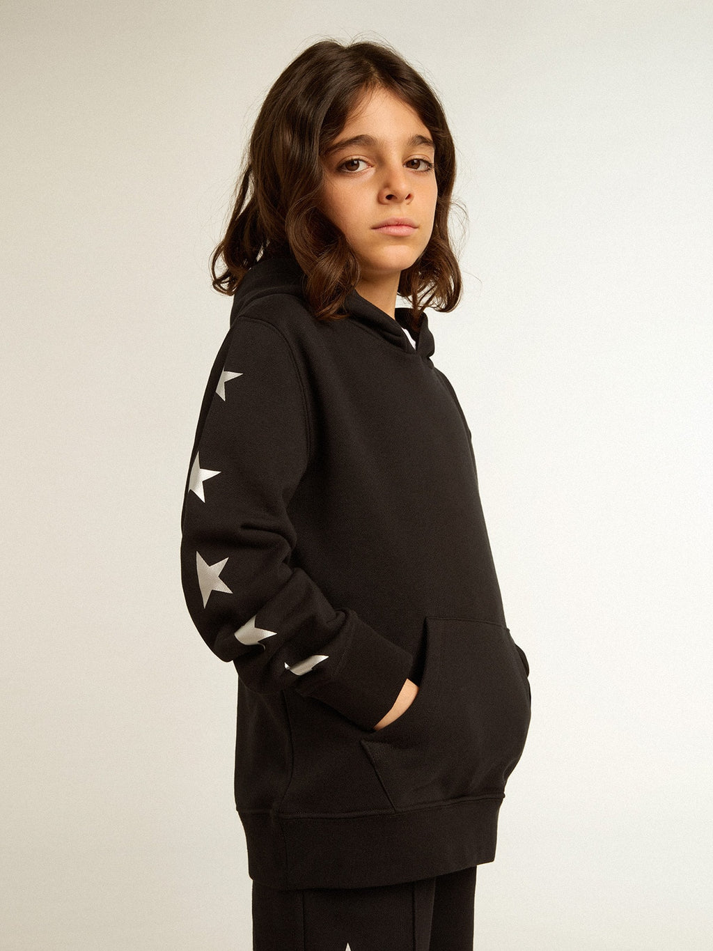 Boys’ hooded sweatshirt in black with contrasting silver stars