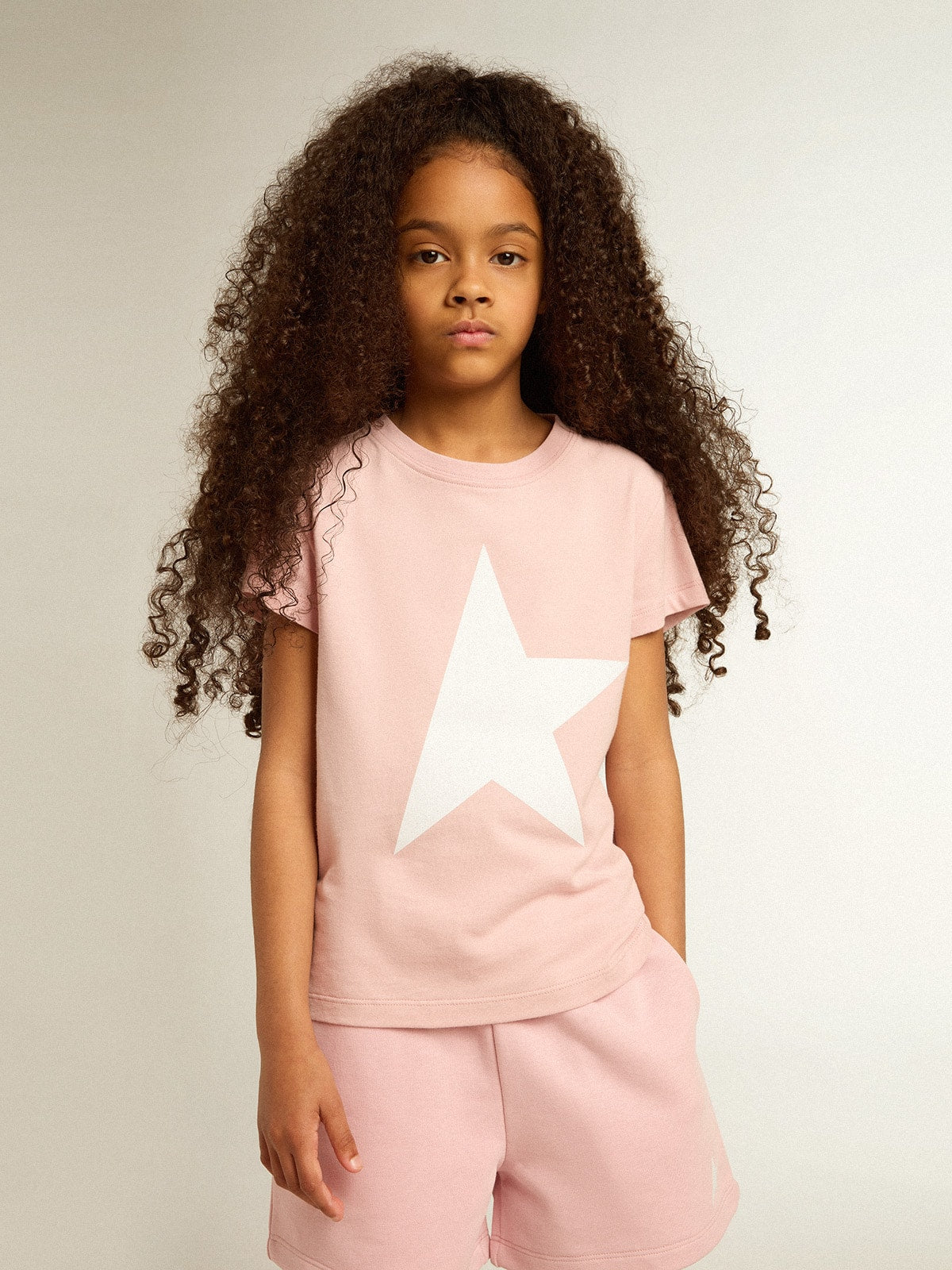 Girls’ pink T-shirt with white logo and maxi star