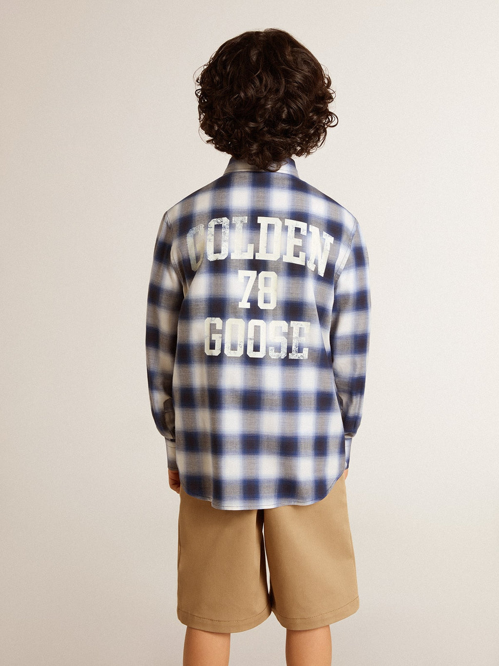 Boys' blue and white checked shirt with print on the back