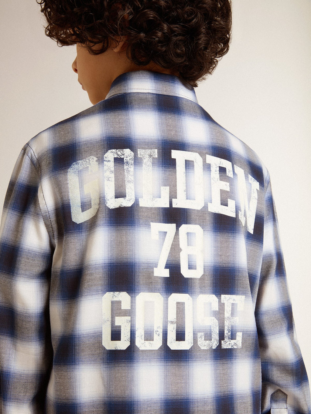 Boys' blue and white checked shirt with print on the back