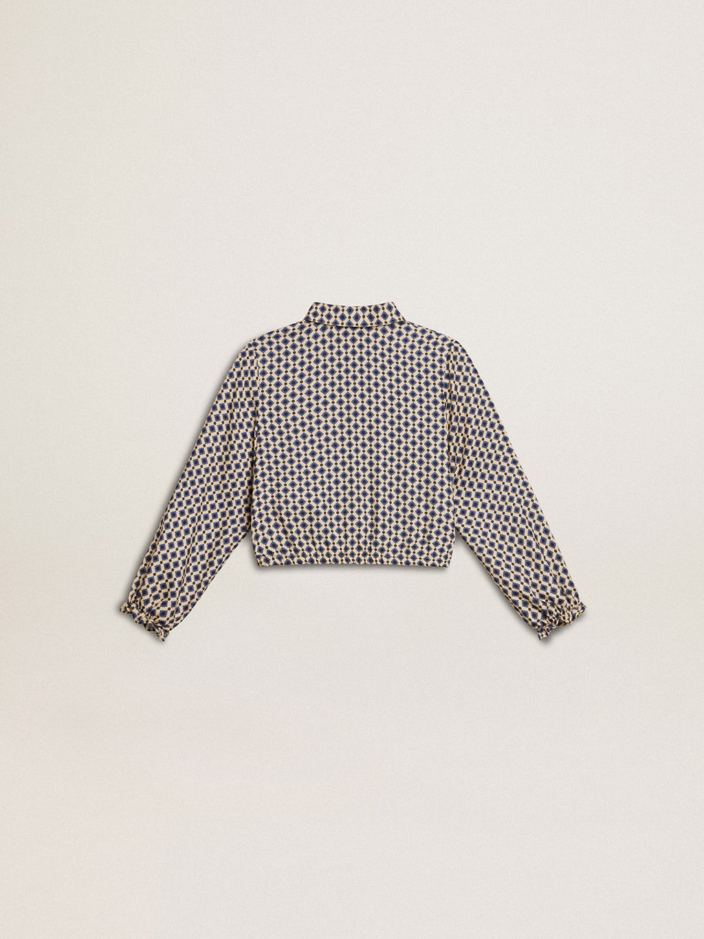 Girls' polo shirt with geometric print