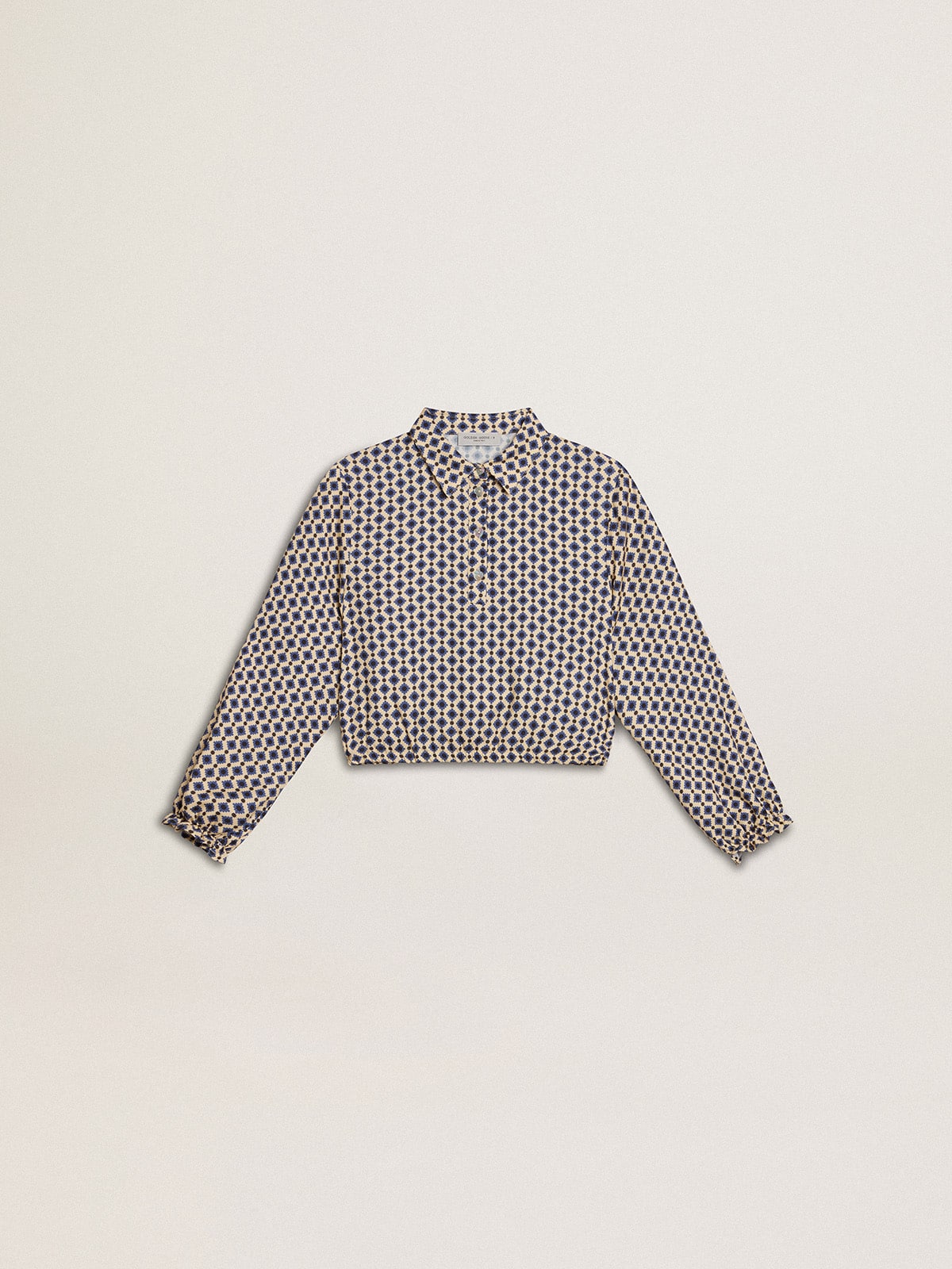Girls' polo shirt with geometric print