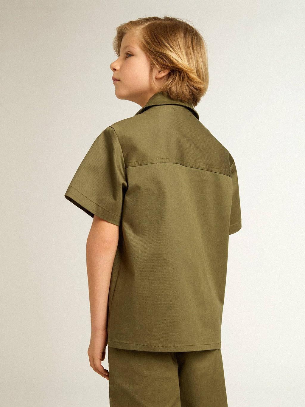 Boys’ military-green shirt
