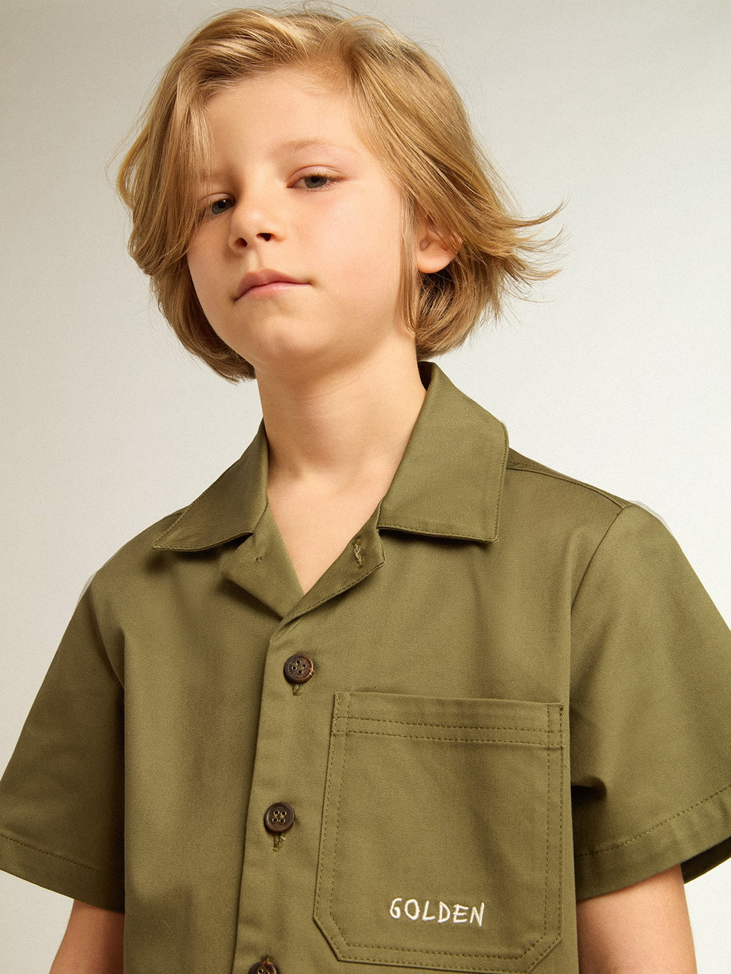 Boys’ military-green shirt