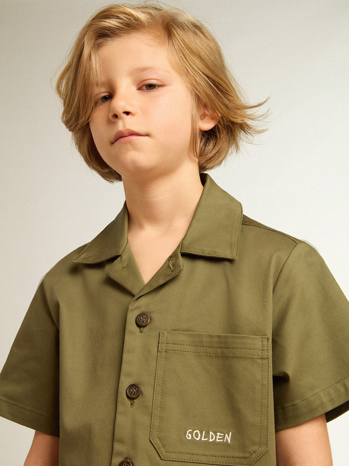 Boys’ military-green shirt