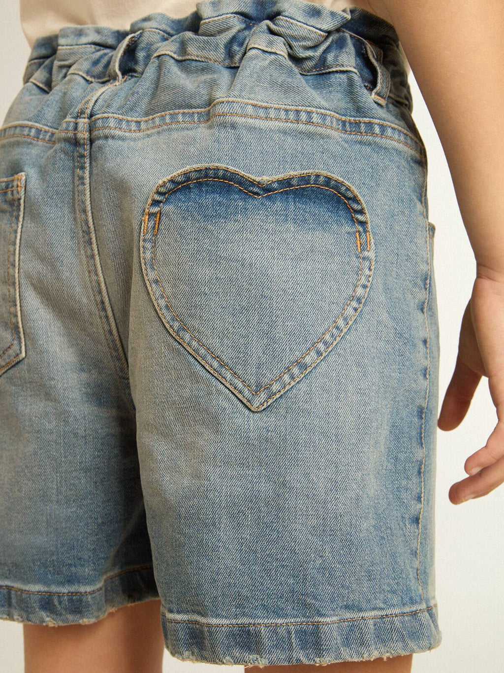Girls’ denim shorts with distressed finish