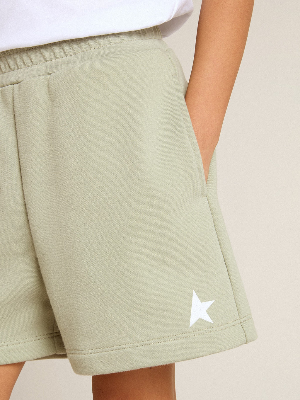 Light green shorts with white star