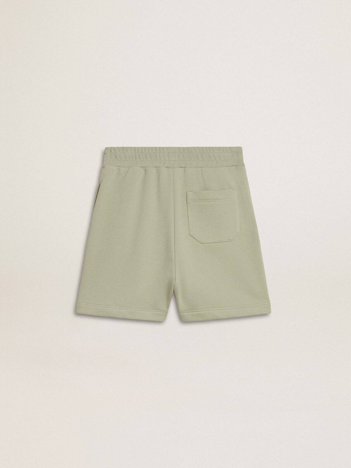 Light green shorts with white star