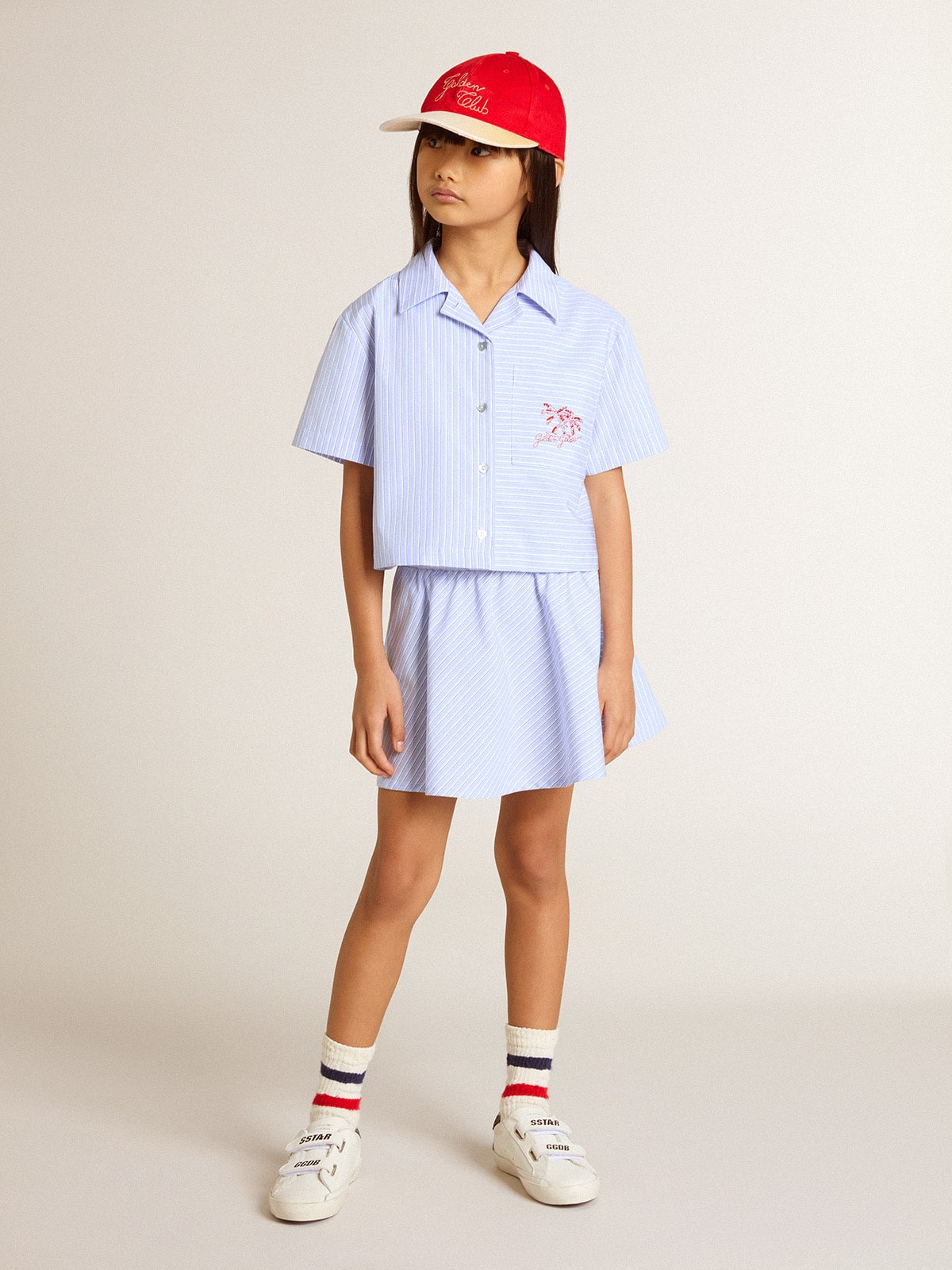 Girls' skirt with light blue stripes