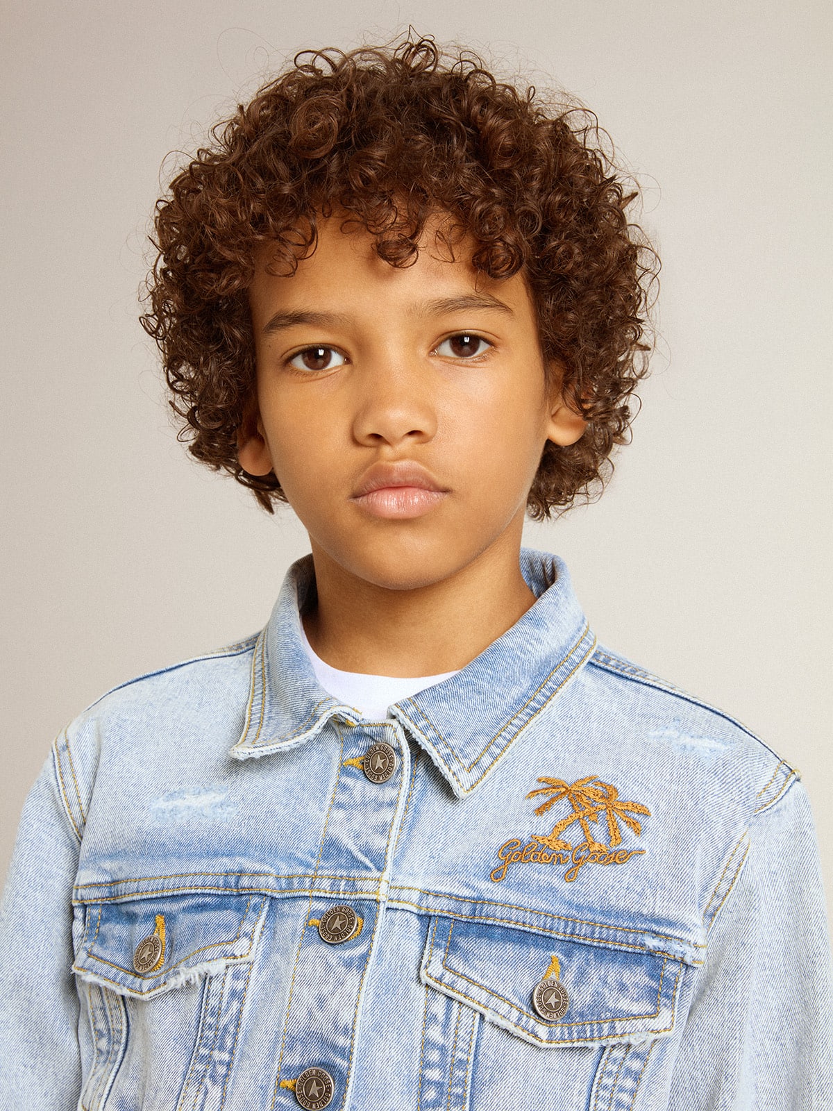 Light denim jacket with embroidery