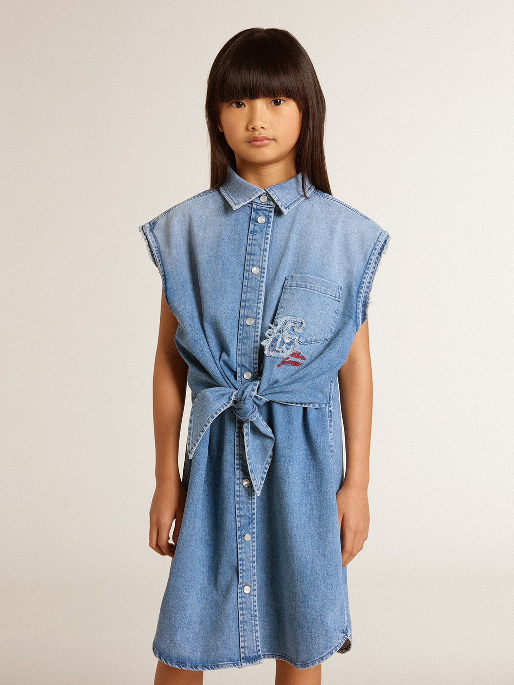 Girls' denim dress with front knot and embroidery