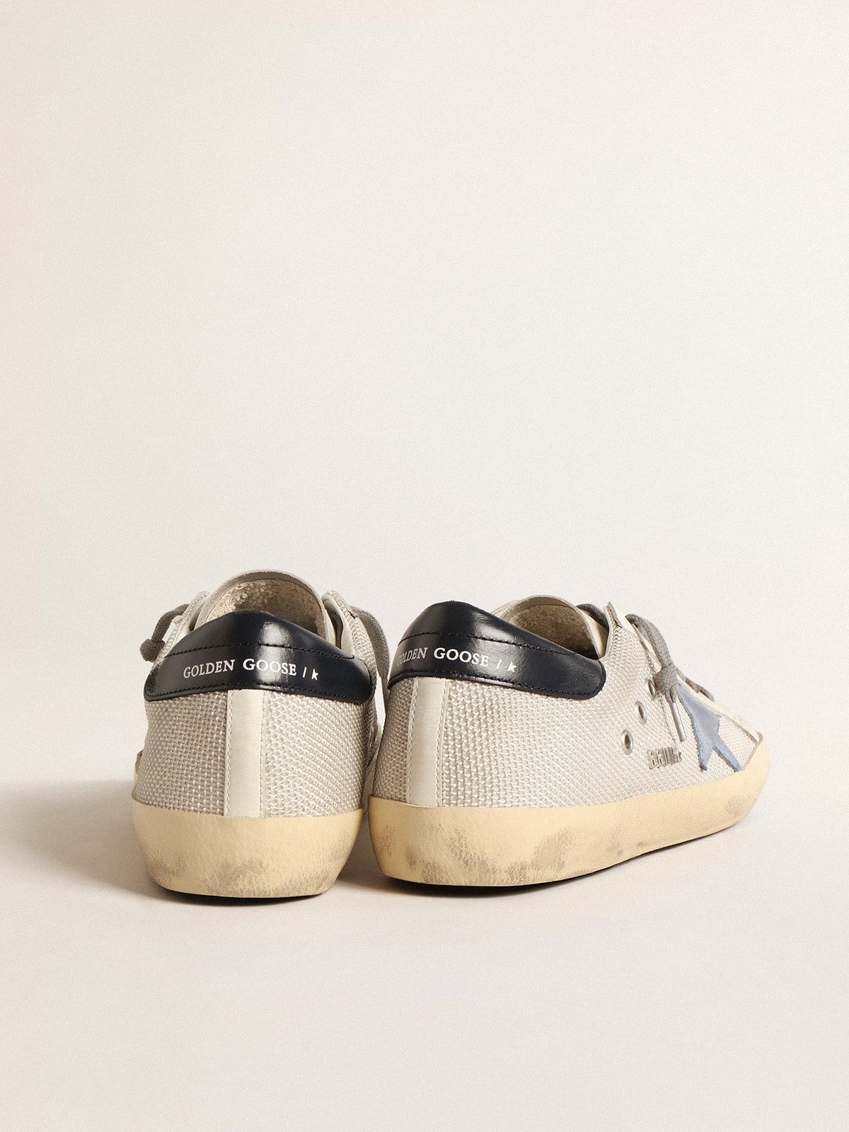 Super-Star in pale silver mesh with light blue suede star
