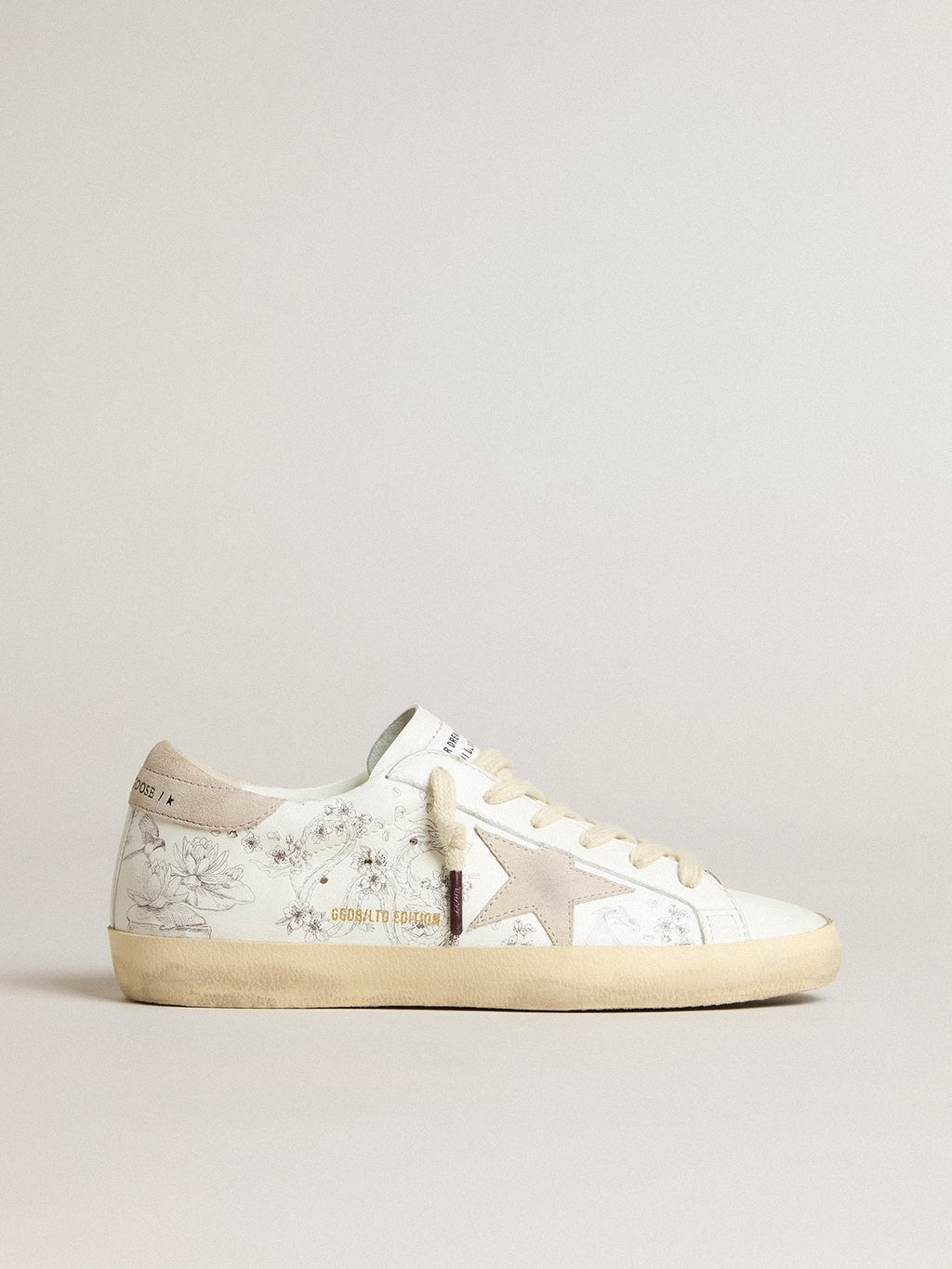 Men’s Super-Star LTD CNY in white leather with lettering on the upper