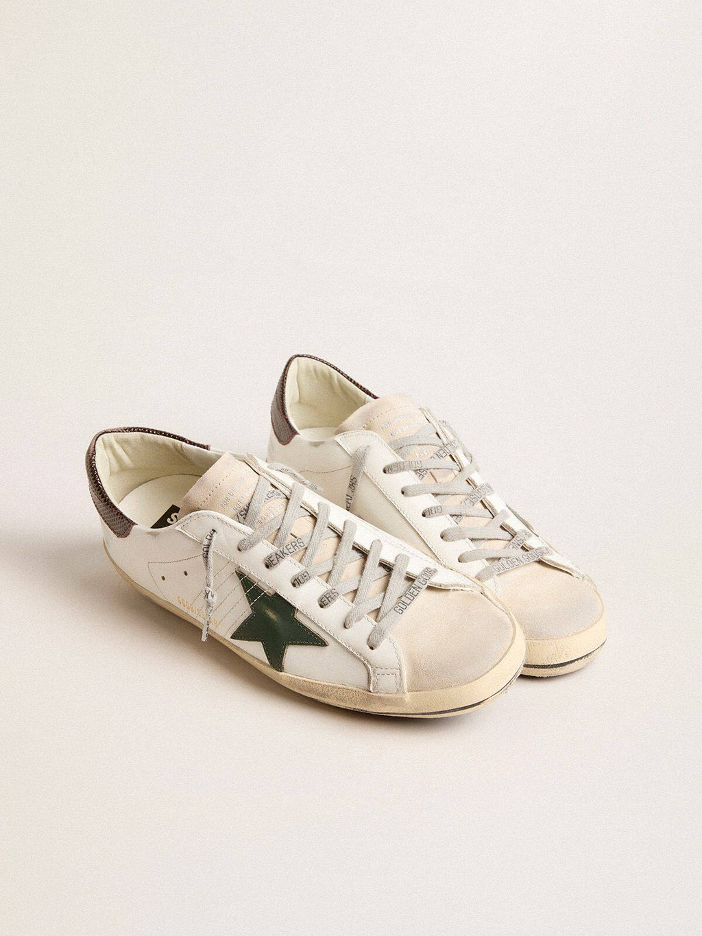 Men’s Super-Star in white leather with green star and animal-print heel tab