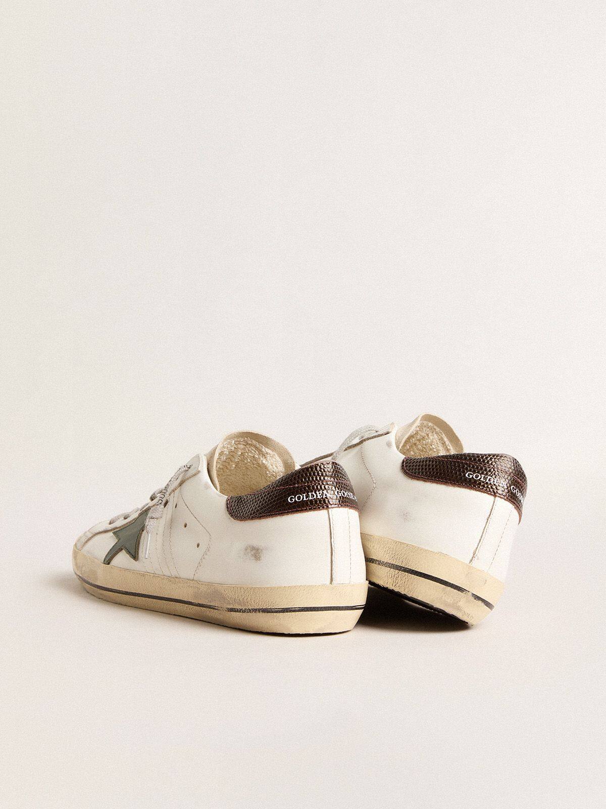 Men’s Super-Star in white leather with green star and animal-print heel tab