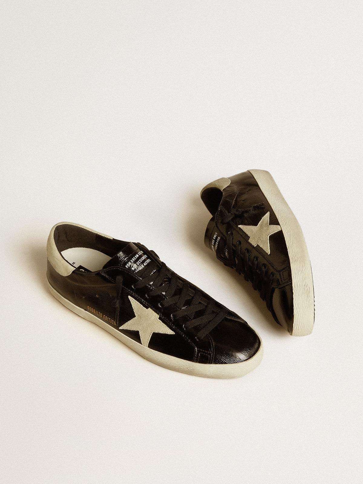 Men's Super-Star LTD in black patent leather with suede star and heel tab