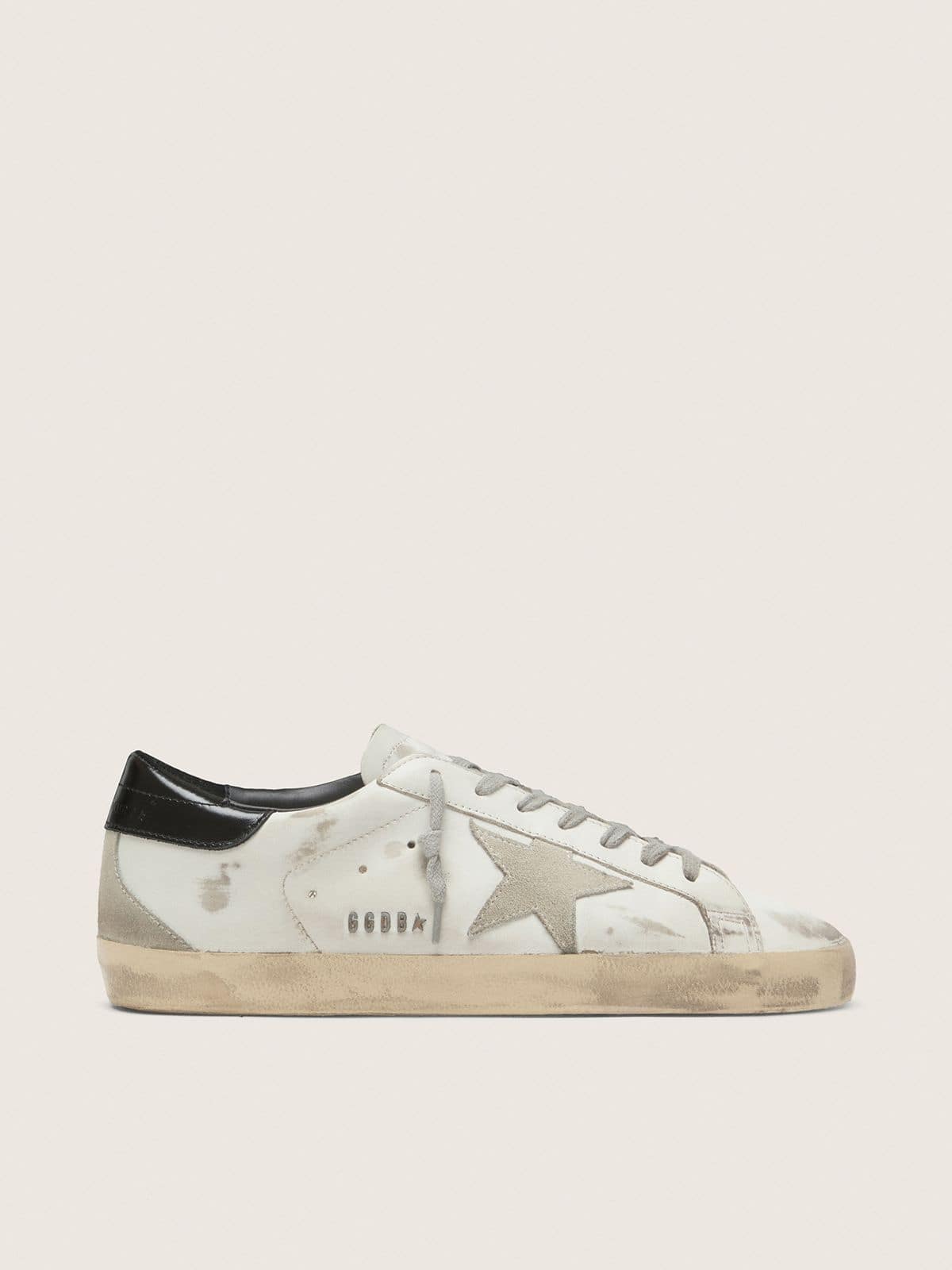 Men's Super-Star with black heel tab and metal stud lettering