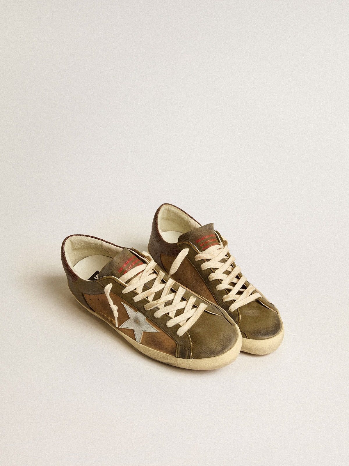 Super-Star LTD in green leather and tobacco-colored suede with silver star