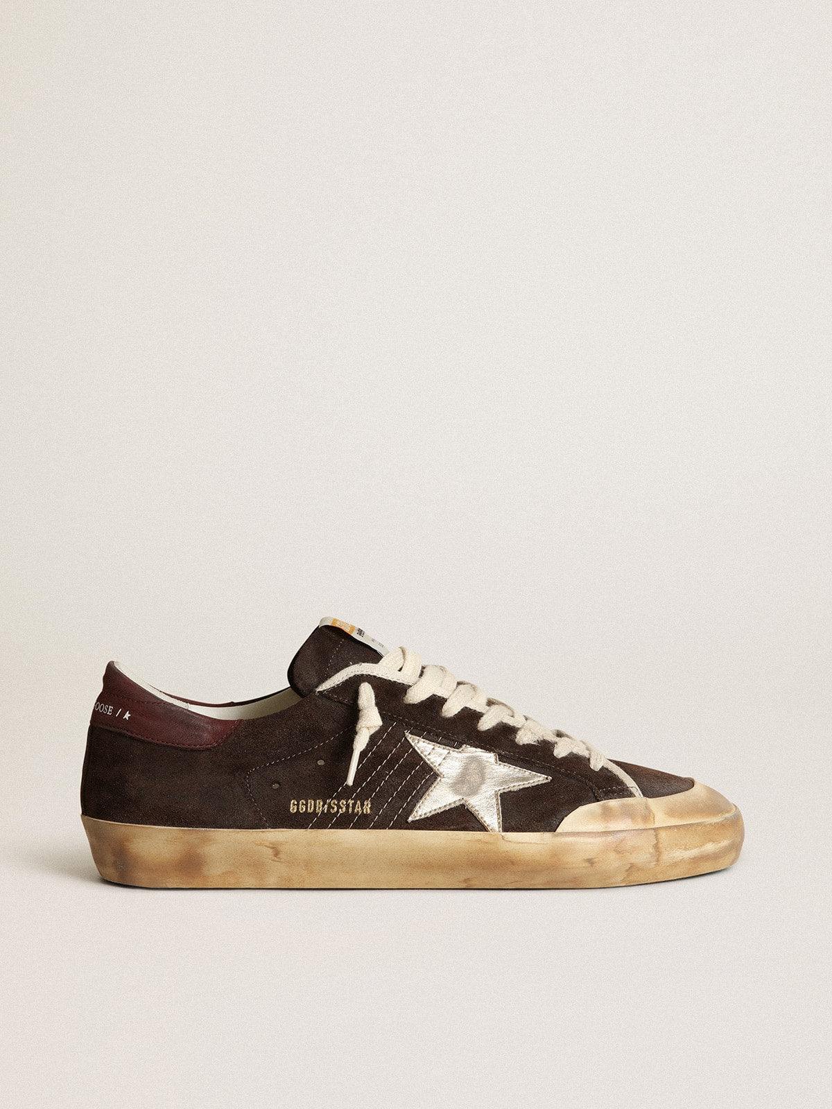 Men's Super-Star Penstar in brown suede with a platinum star