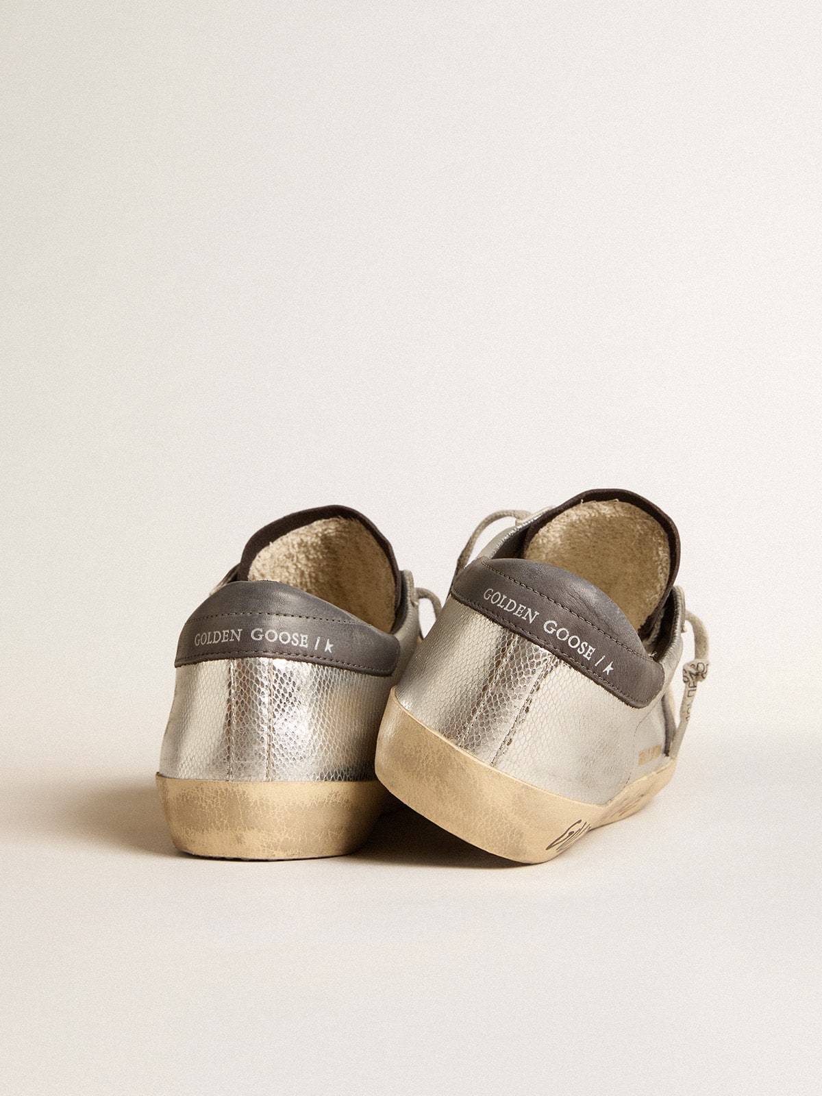 Men's silver Super-Star LTD with black nubuck star and heel tab