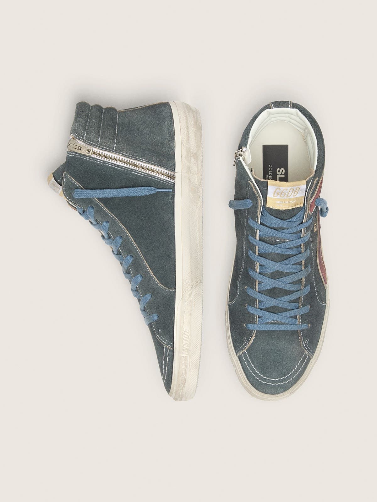 Slide in gray suede with brown nubuck star and flash