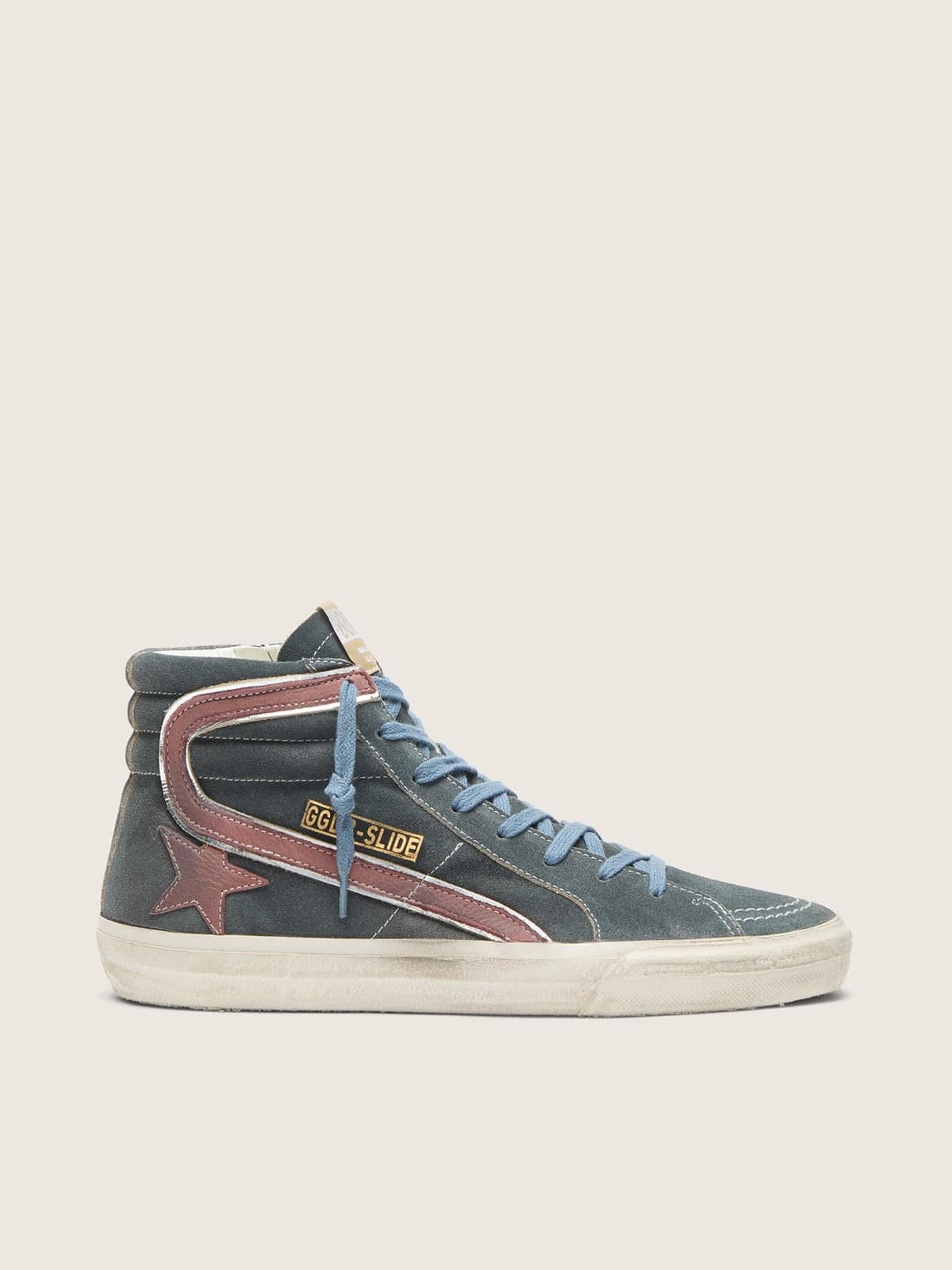 Slide in gray suede with brown nubuck star and flash